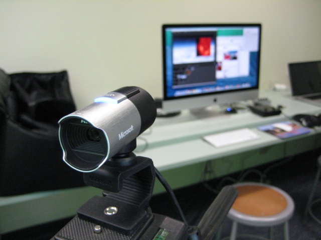 Webcam with Wirecast software in background