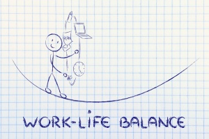 Vlog Video Blog Series work-life balance: working father juggling with pc and pacifier